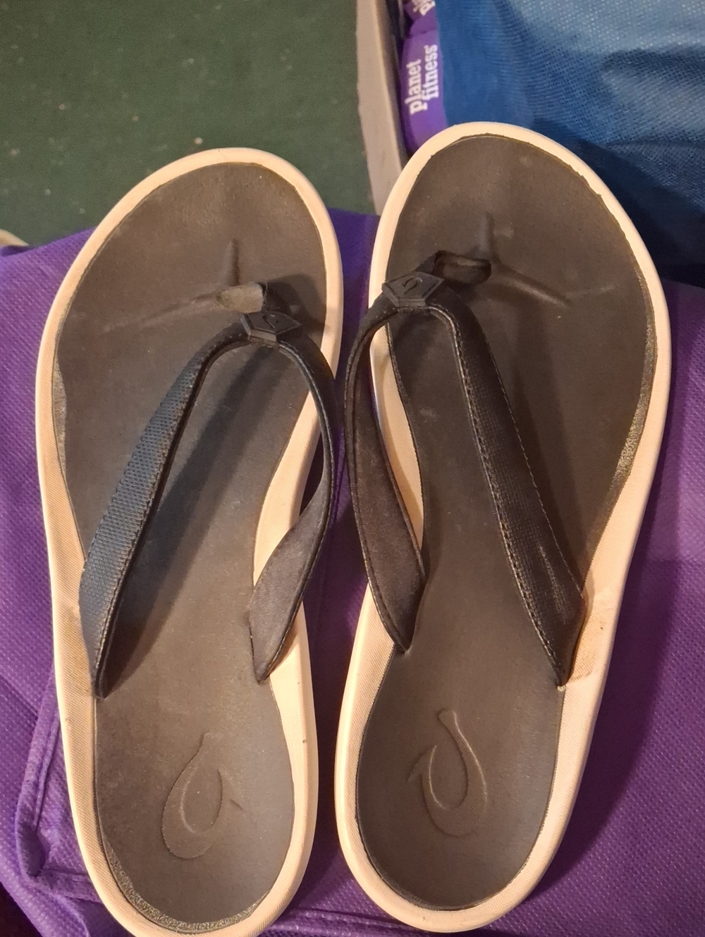 OluKai Black and Cream Women's Flip Flop Sandals
